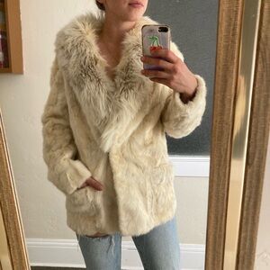 White fur coat real fur I think fox on the collar and mink on the body